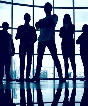 silhouette-confident-businesspeople-scaled-e1752478537405.jpg